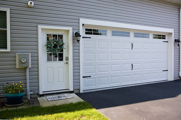 24/7 Emergency Garage Door Panel Replacement experts in Colby, KS